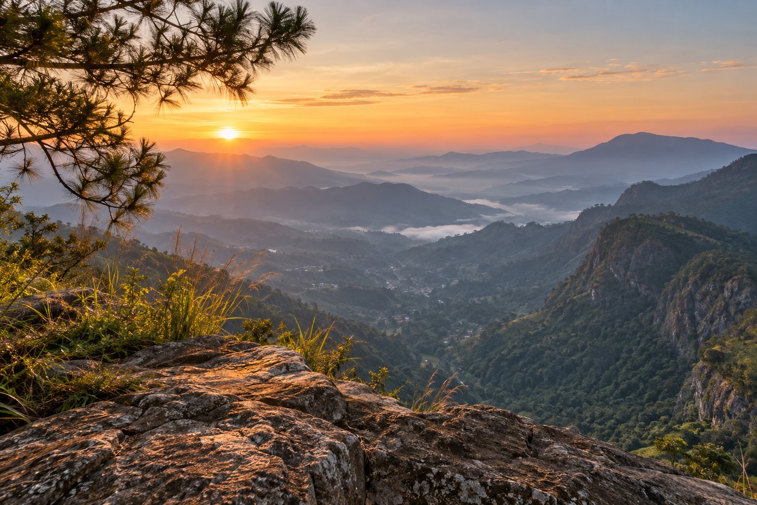 Sunrise over the layered hills from the Ella Rock lookout
