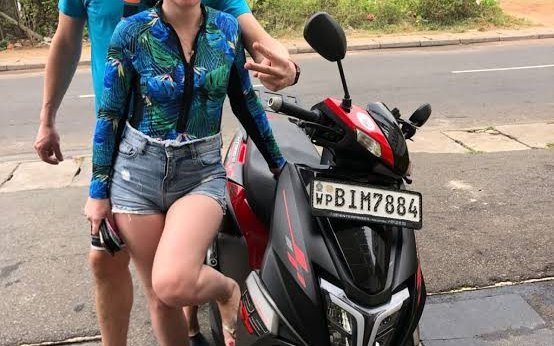 Travellers with a rented scooter in Ella, Sri Lanka