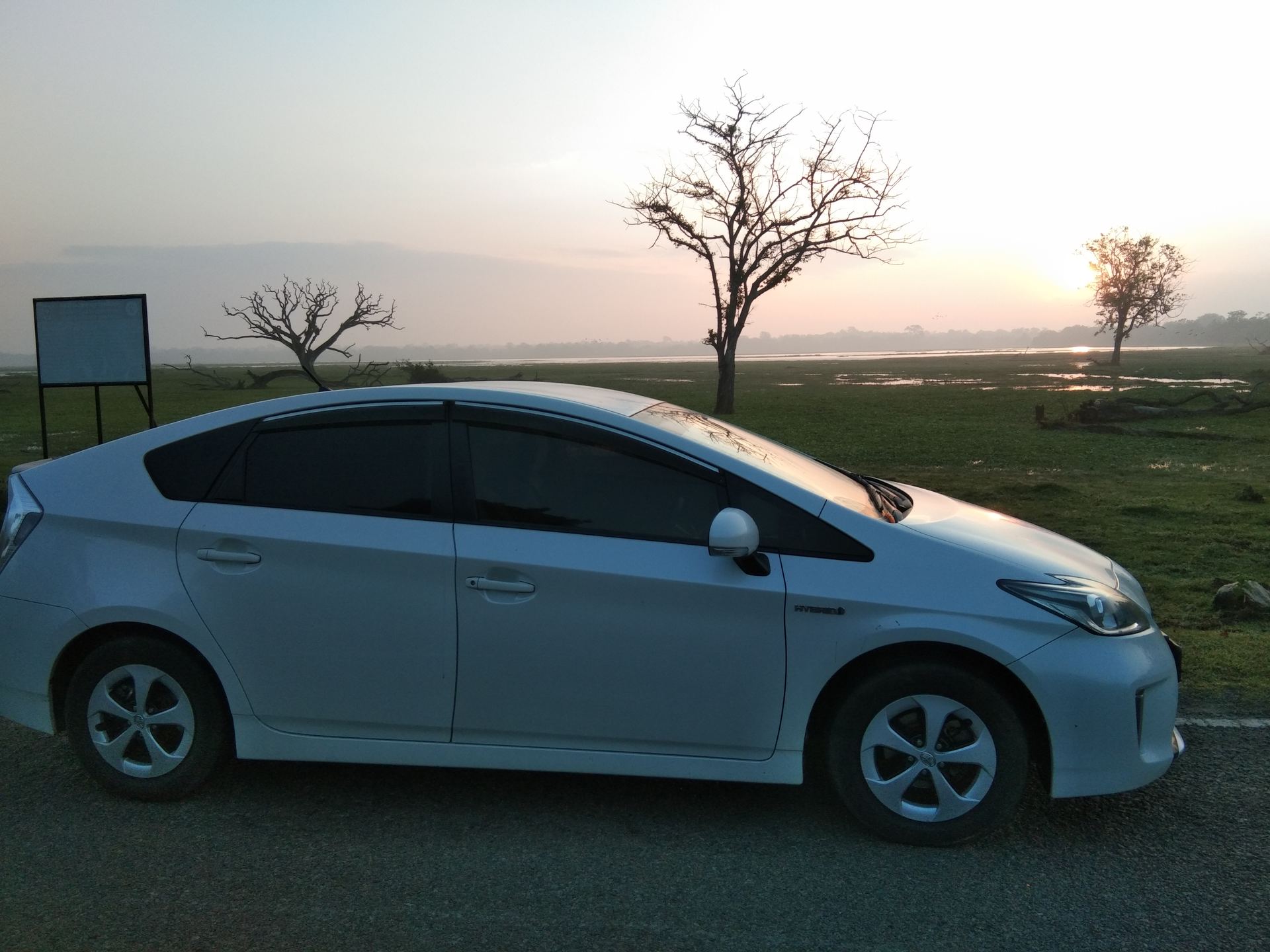 Private air-conditioned transfer car at sunrise in Sri Lanka